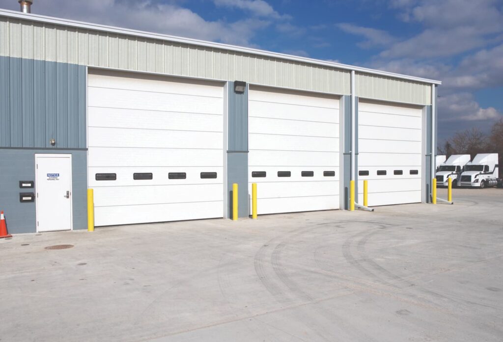 commercial garage door with trucks